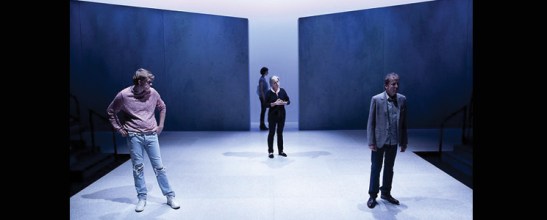 Production photo of 'Fury's' angular, cold set with characters Joe, Patrick and Alice.